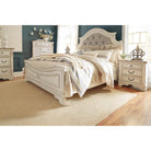 Realyn King Upholstered Panel Bed with Dresser
